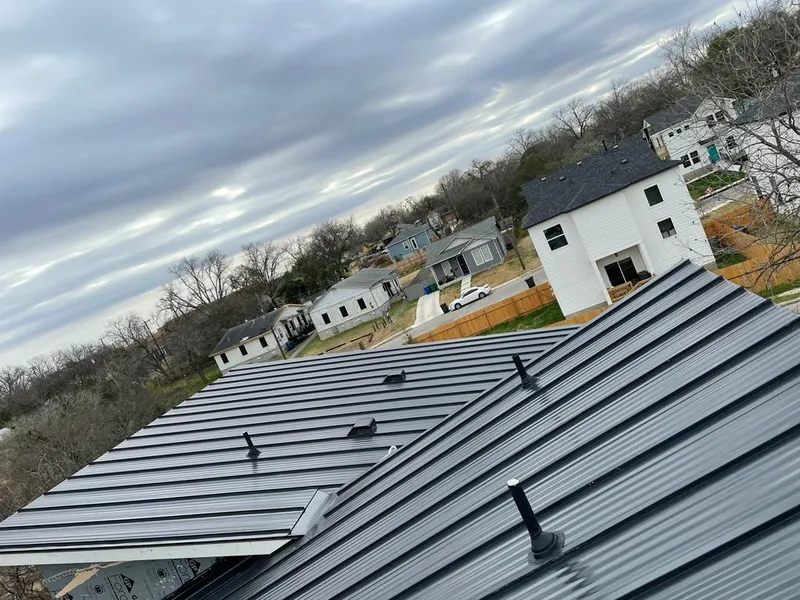 Standing seam metal roof panels with vents for Skylight Repair in Grimes
